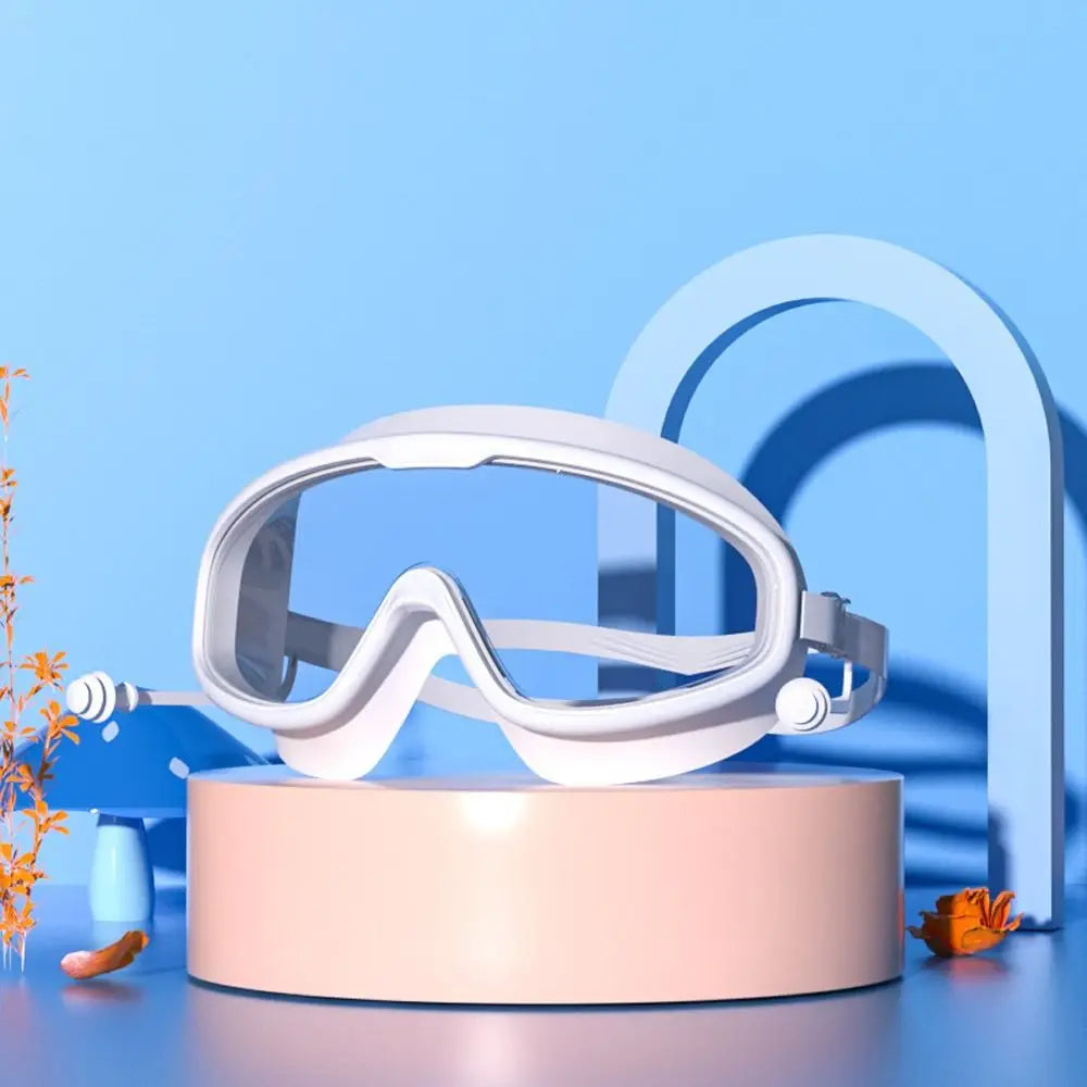 Schwimmbrille für Kinder im Alter von 3–15 Jahren, beschlagfrei, auslaufsicher, transparent, für Jungen und Mädchen, für Pool und Strand