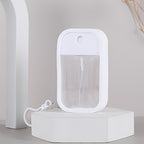 50 ml kleine, tragbare, nachfüllbare Handdesinfektionsmittel-Sprühflasche aus ABS + PP-Material mit Parfümfunktion