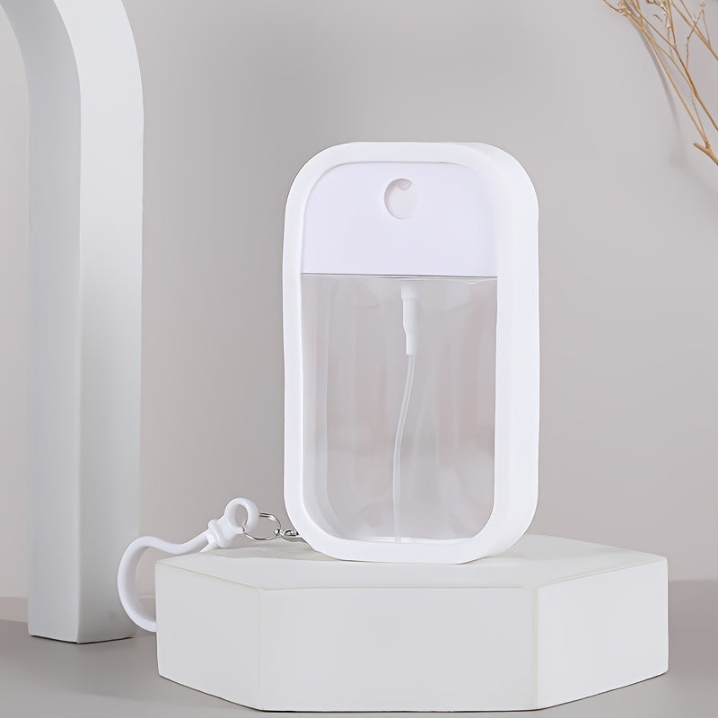 50 ml kleine, tragbare, nachfüllbare Handdesinfektionsmittel-Sprühflasche aus ABS + PP-Material mit Parfümfunktion