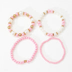 4-teiliges Set schlichter weißer Kunstperlen-Herzarmbänder, elegantes handgefertigtes Schmuckaccessoire