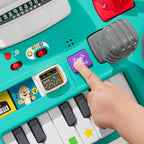 FISHER-PRICE HXG09 Lernspaß DJ-Spieltisch – Musikalisches Lernspielzeug mit 3 Klavierspielmodi, Lichtern, 12 Motorikaktivitäten und über 100 Liedern und Tönen, spricht Deutsch, ab 6 Monaten / 1 Jahr