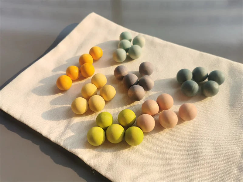 Hochwertige Regenbogen-Musik, klingende Bäume, Holzblütenblätter, Montage und Marmor-Lauf-Bälle, die Kinder-Lernspielzeug verfolgen