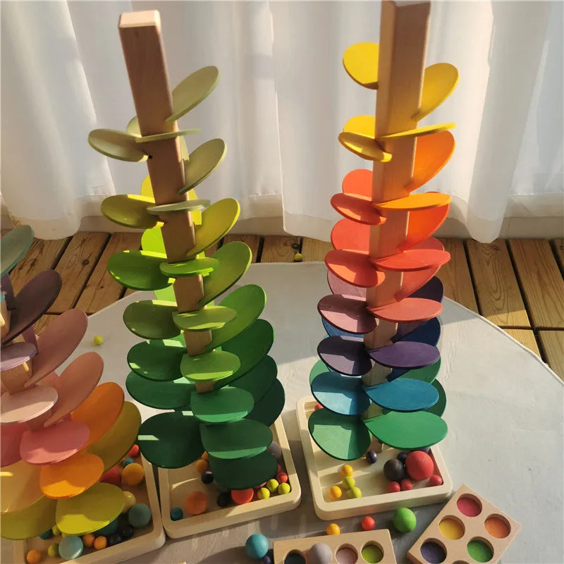 Hochwertige Regenbogen-Musik, klingende Bäume, Holzblütenblätter, Montage und Marmor-Lauf-Bälle, die Kinder-Lernspielzeug verfolgen