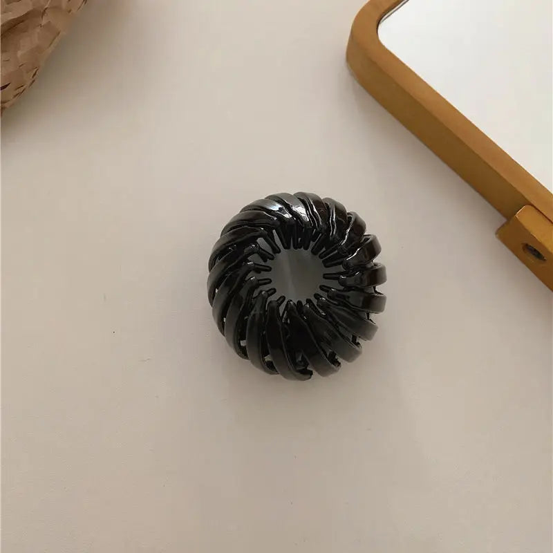 Einziehbarer Pferdeschwanzhalter