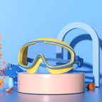 Schwimmbrille für Kinder im Alter von 3–15 Jahren, beschlagfrei, auslaufsicher, transparent, für Jungen und Mädchen, für Pool und Strand
