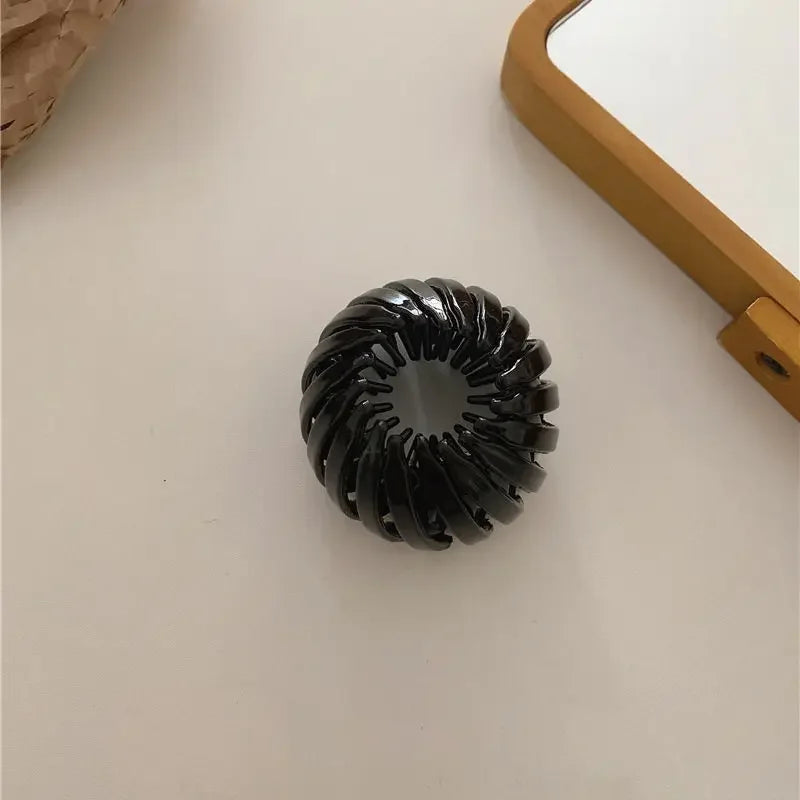 Einziehbarer Pferdeschwanzhalter