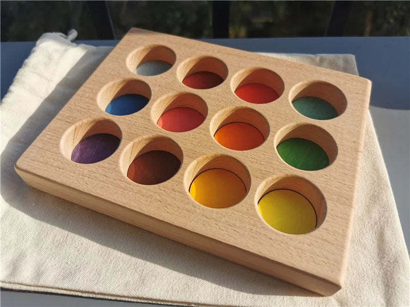 Hochwertige Regenbogen-Musik, klingende Bäume, Holzblütenblätter, Montage und Marmor-Lauf-Bälle, die Kinder-Lernspielzeug verfolgen