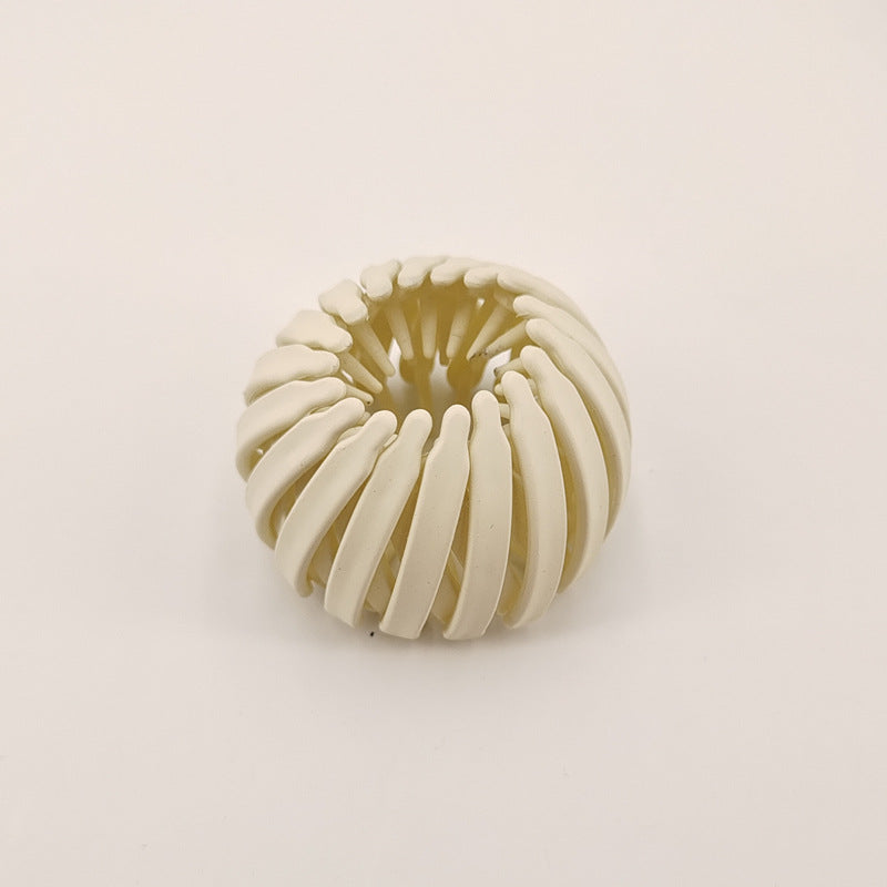 Einziehbarer Pferdeschwanzhalter