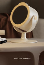 Die tragbare Mini-Heizung mit zweistufiger Warmlufteinstellung eignet sich für den Einsatz auf Heim- und Büroschreibtischen sowie Fußwärmer