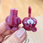 24 Schokoladenbär-Schlüsselanhänger, matter Lipgloss in 6 Farben, antihaftbeschichtete Becher, glattes und nicht klebendes Lipgloss-Display-Box-Set zum Selbermachen – die perfekte Geschenkidee für Feste